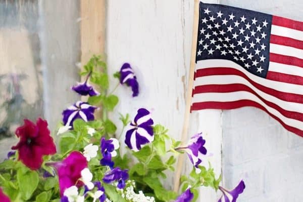 American flag and flowers